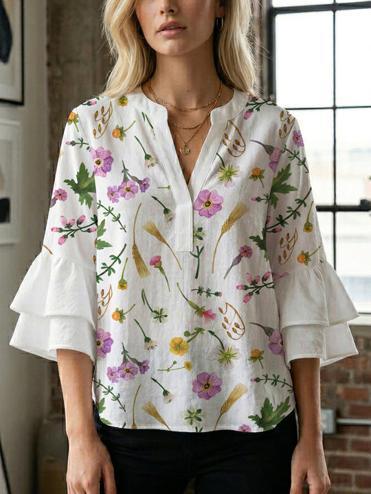 Damen Blusenshirt mit voluminösen Ärmeln und floralem Muster EB