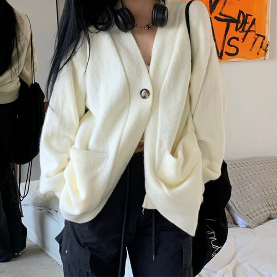 Damen Gemütlicher Strickcardigan mit großen Taschen und asymmetrischem Schnitt EB