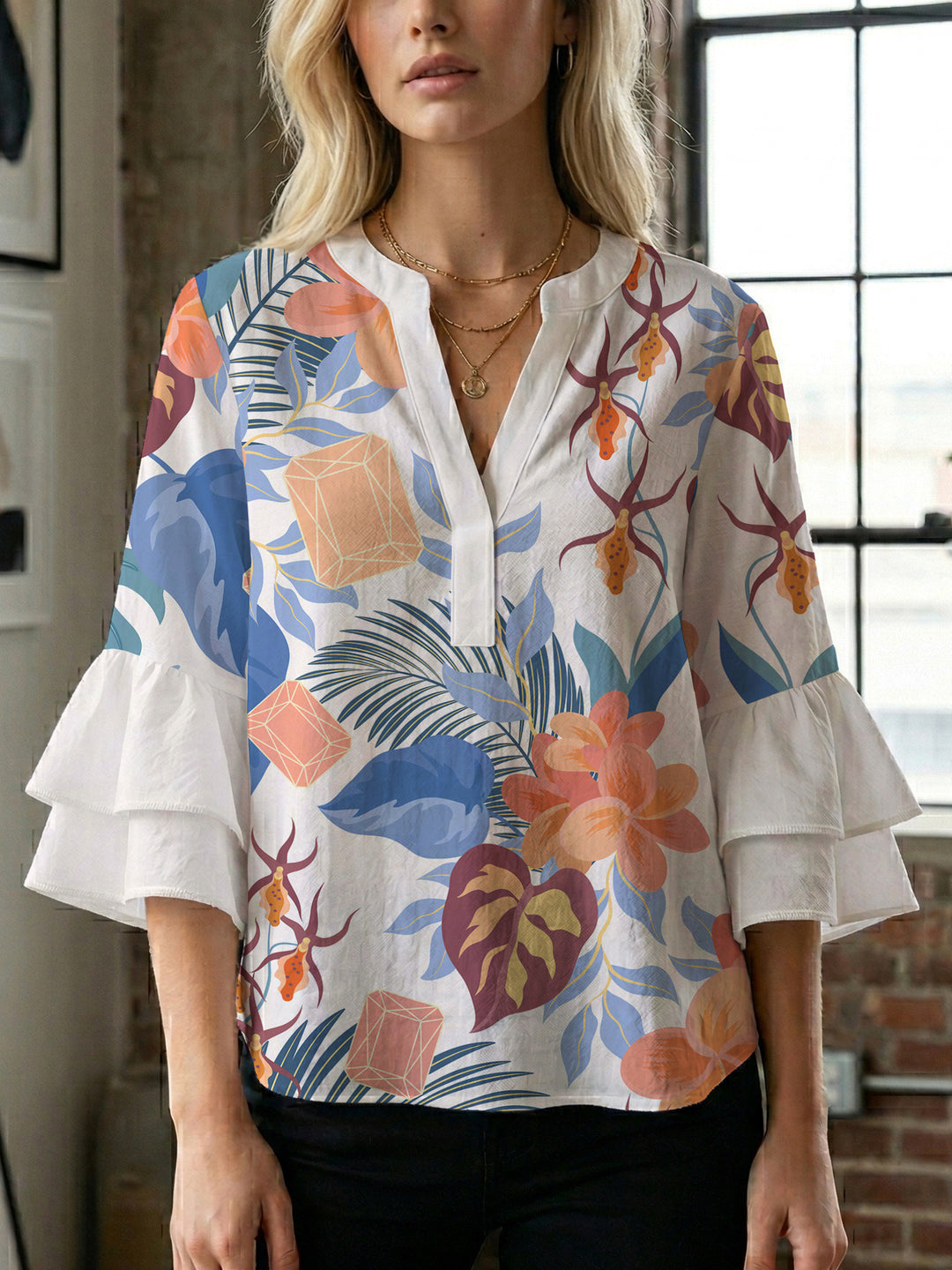 Damen Bluse mit voluminösen Rüschenärmeln und floralem Druck EB