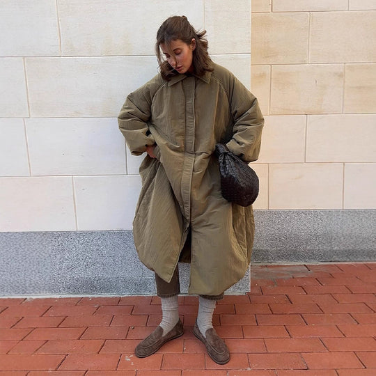 Damen Oversized Steppjacke mit elegantem Schnitt und praktischen Taschen EB