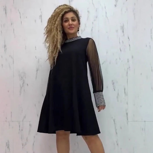 Damen Kleid mit transparenten Ärmeln und funkelndem Kragen Heidi-Mode