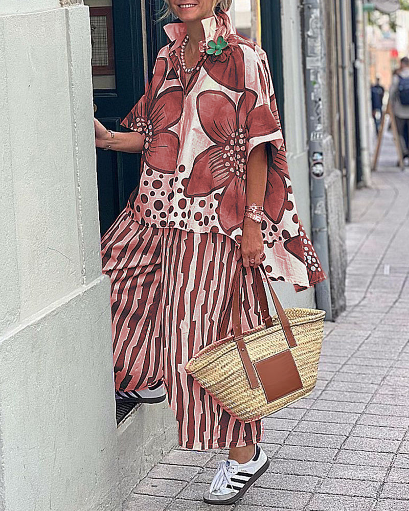 Damen Übergroßes Tunika-Set mit floralem Muster und gestreiften Hosen EB