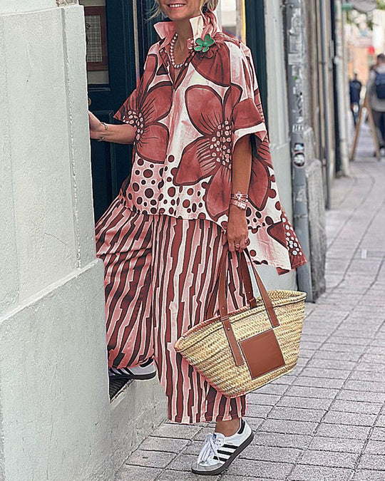 Damen Übergroßes Tunika-Set mit floralem Muster und gestreiften Hosen EB
