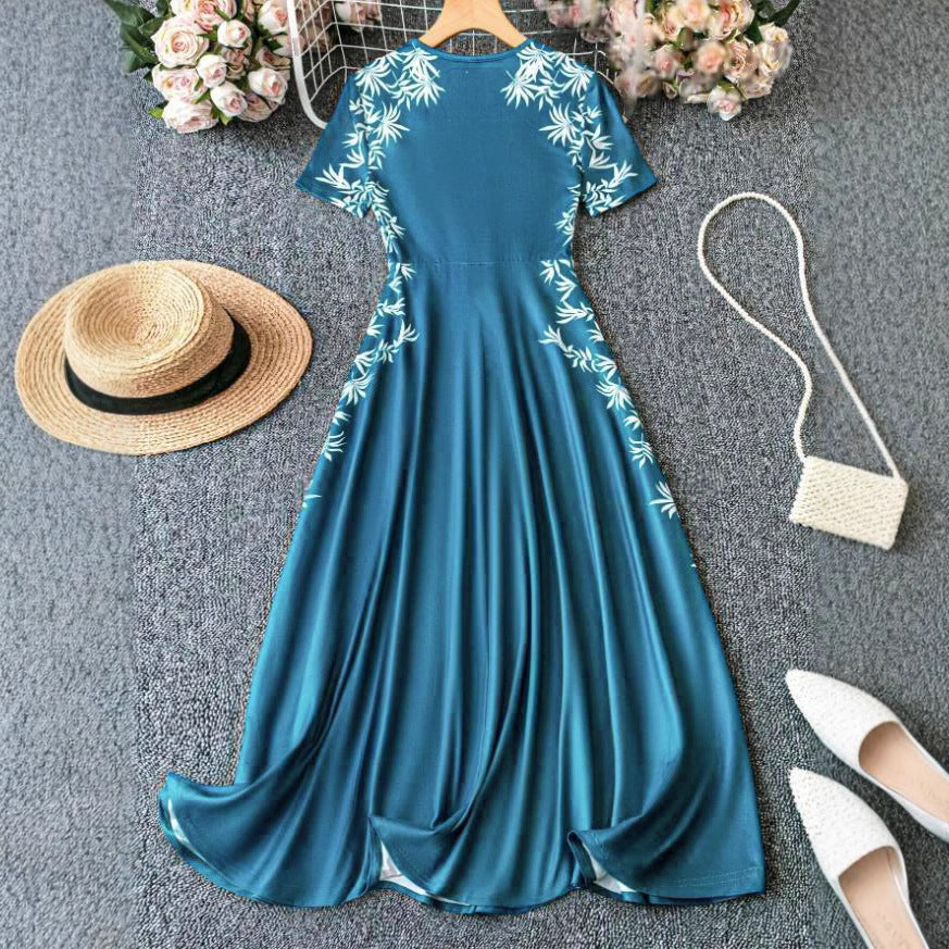 Damen Strandkleid mit floralem Design und fließendem Schnitt EB
