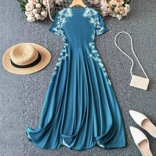 Damen Strandkleid mit floralem Design und fließendem Schnitt EB