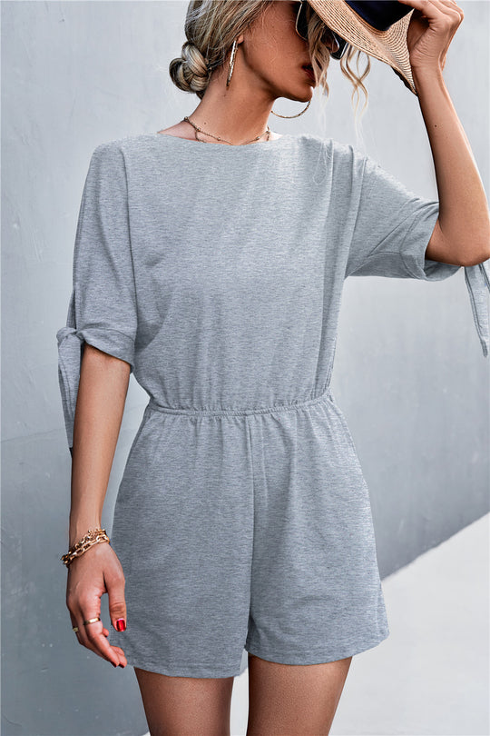 Damen Jumpsuit mit luftiger Passform und modischen Ärmelbändern EB