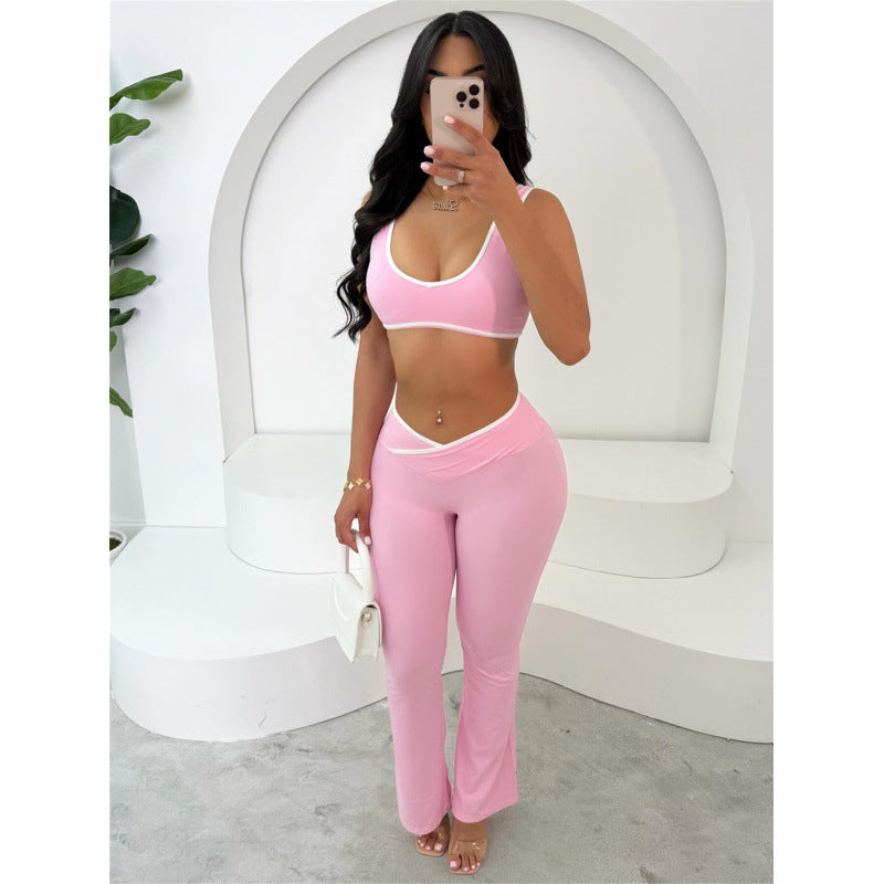 Damen Sportliches Zweiteiler Set mit kurzer Oberteil und flared Leggings EB