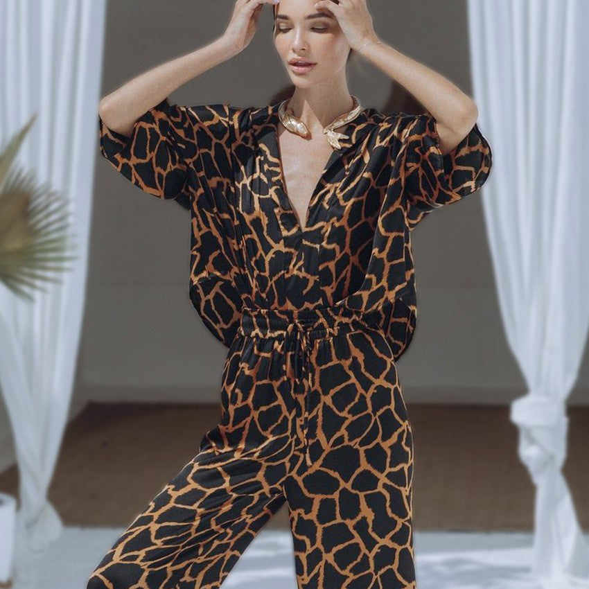 Damen Jumpsuit mit weit geschnittenen Beinen und elegantem Giraffenmuster EB