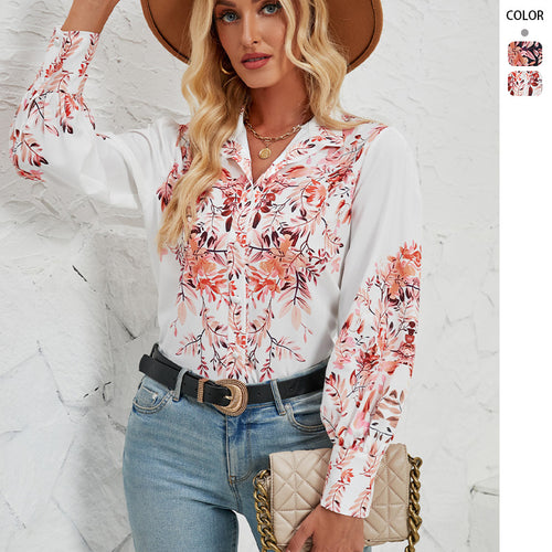 Damen Elegante Bluse mit floralem Design und voluminösen Ärmeln EB
