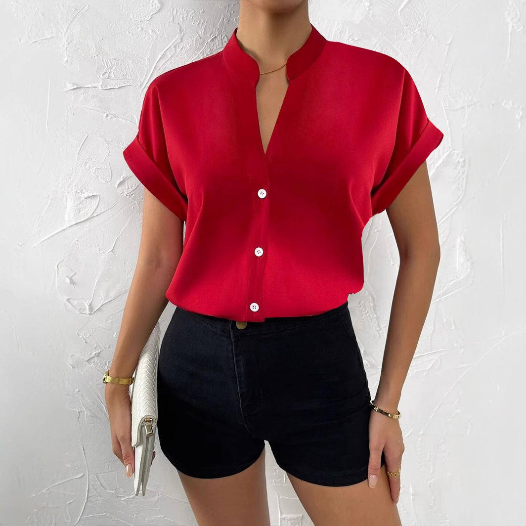 Damen Elegante Kurzarmbluse mit Stehkragen und subtilen Knopfdetails EB