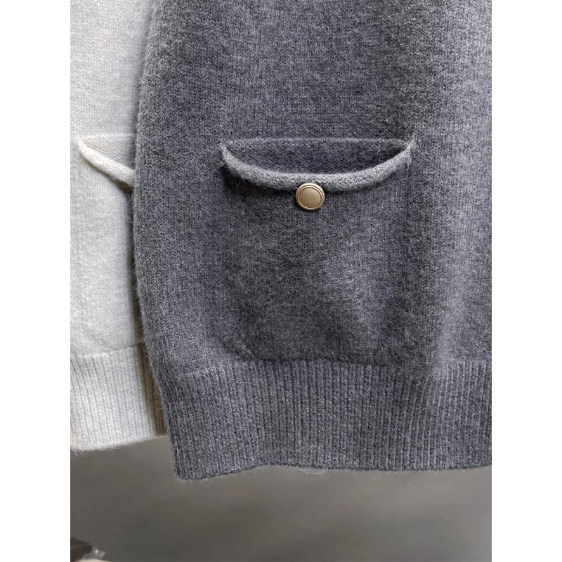 Damen Strickweste mit Knopfdetails und seitlichen Taschen EB