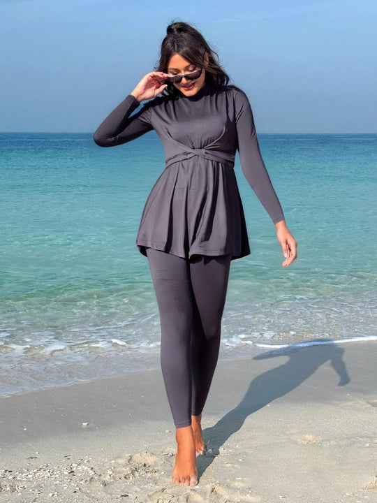 Damen modischer Longsleeve-Badeanzug mit Wickelrock EB