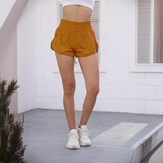 Damen Sportliche Laufshorts mit elastischem Bund und seitlichen Taschen EB