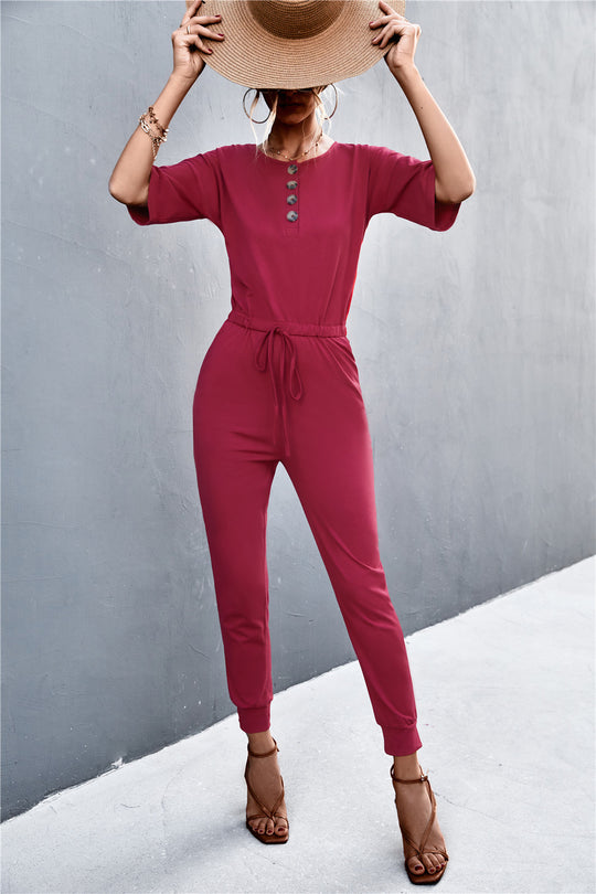 Damen Jumpsuit mit elegantem V-Ausschnitt und praktischen Taschen EB