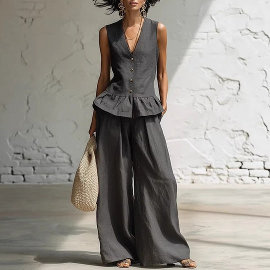 Damen lässiger Jumpsuit mit peplum Schnitt und Knopfdetails EB