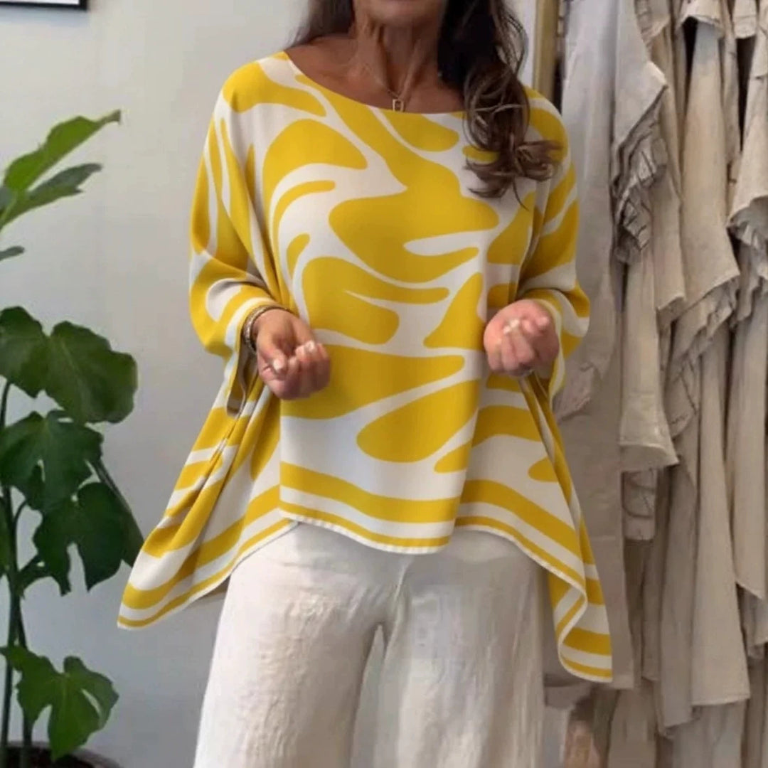 Damen Oversize Sommerbluse mit abstraktem Print, Fledermausärmeln und asymmetrischem Saum EB
