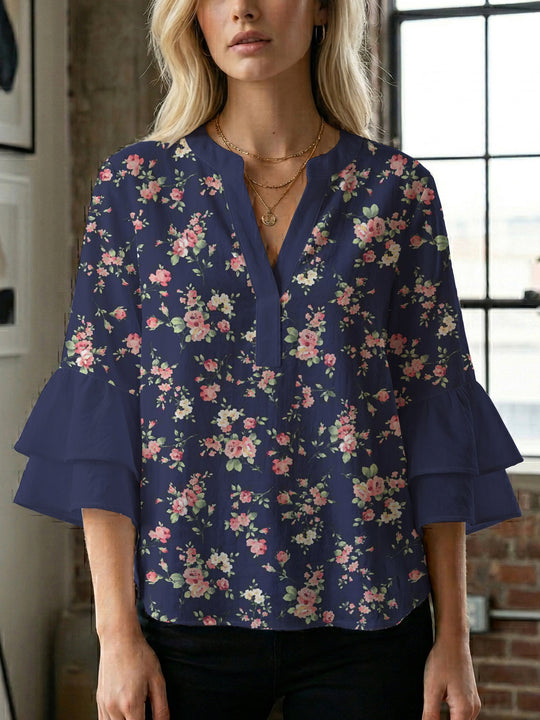 Damen Bluse mit voluminösen Ärmeln und floralem Design EB