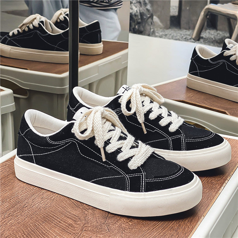 Unisex Low-Top Canvas-Sneaker mit verstärkten Nähten, gepolstertem Komfortkragen und vulkanisierter Gummisohle EB