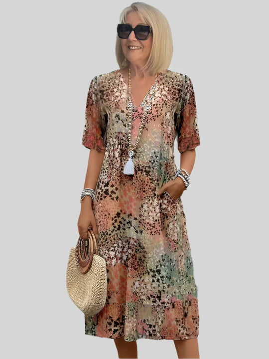 Damen Sommerliches Maxikleid mit floralem Design und praktischen Taschen EB