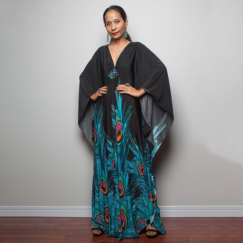 Damen Maxikleid mit kunstvollem Pfauenmuster und seitlichen Schlitzen Heidi Mode