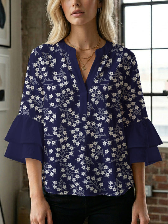 Damen Bluse mit voluminösen Ärmeln und floralem Design EB