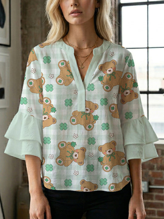 Damen Bluse mit voluminösen Flügelärmel und intensivem Blattmuster EB