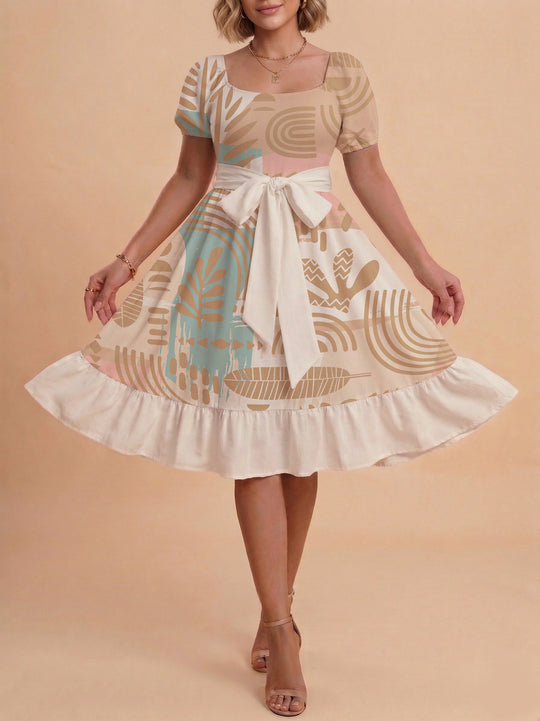 Damen Sommerliches Blumenkleid mit taillierbarem Gürtel und voluminösen Ärmeln EB