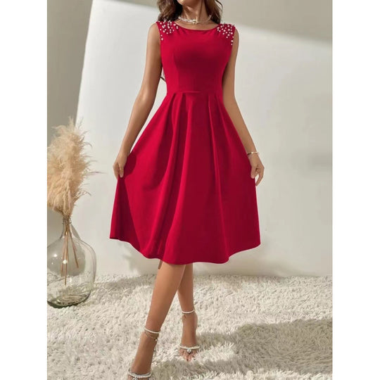 Damen Midi-Kleid mit dekorativen Perlenakzenten und schwingendem Rock EB