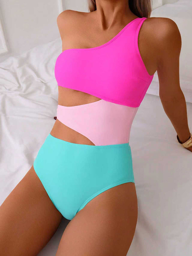 Damen Einteiler Badeanzug mit asymmetrischem Schnitt und trendy Farbkombination EB
