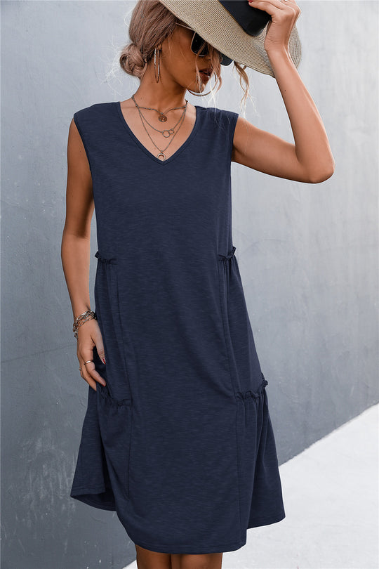 Damen Freizeitdress mit lockerem V-Ausschnitt und Rüschenkanten EB