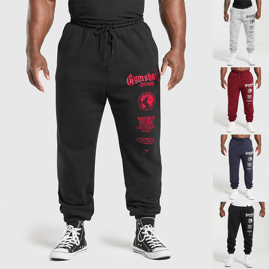 Herren nan konisch geschnittene Baumwollfleece-Sweathose mit elastischem Kordelbund gerippten Beinabschlüssen und großflächigem Logodruck EB
