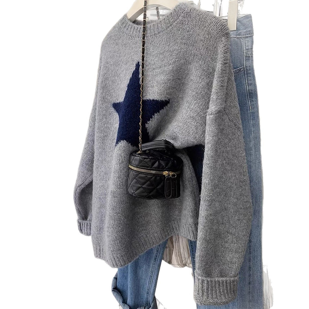Damen nan oversized Strickpullover mit markantem Sternmotiv, Rundhalsausschnitt und gerippten Bündchen EB