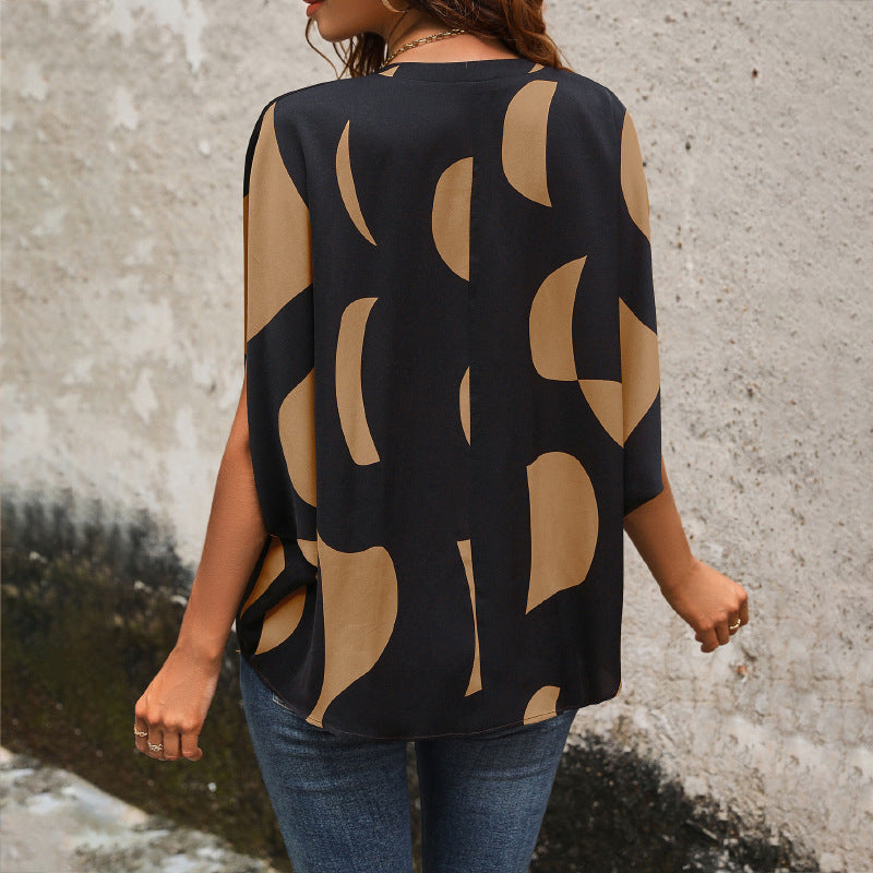 Damen Seidige Bluse mit modernem Schnitt und asymmetrischen Mustern EB