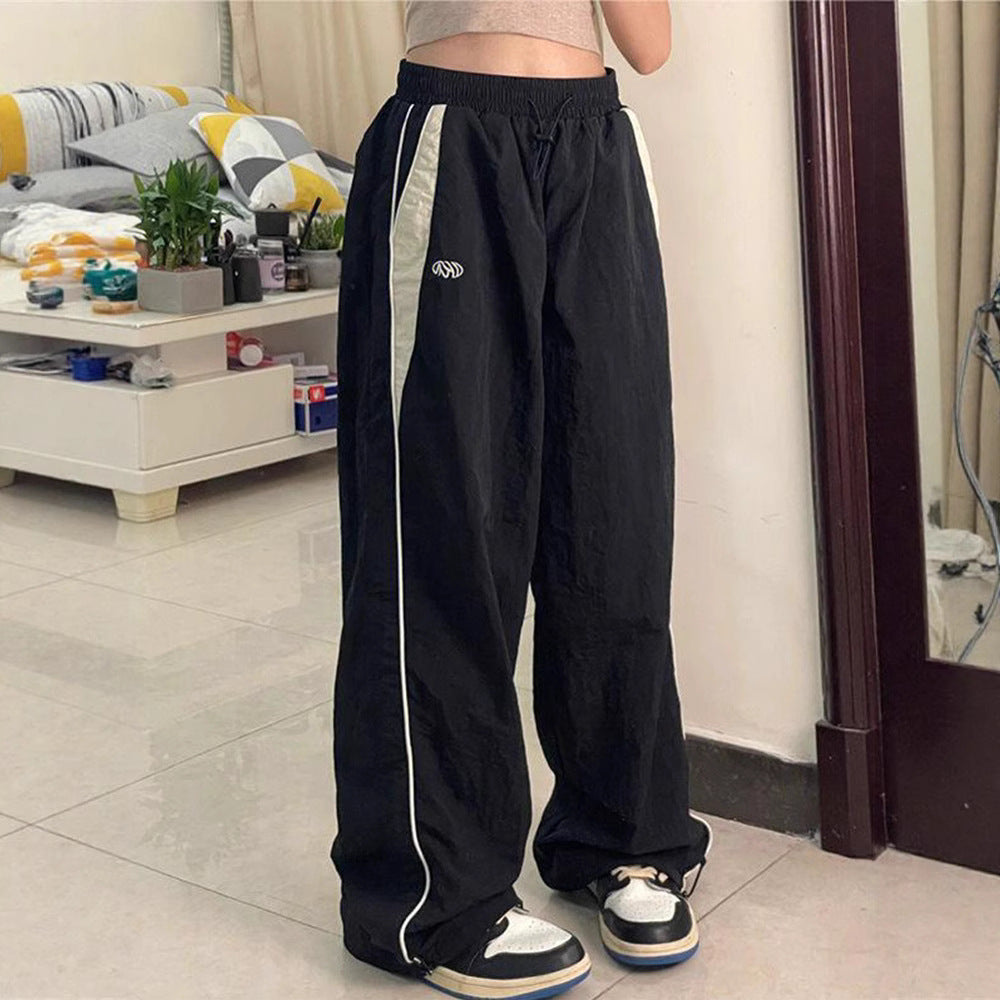 Damen nan weite Trackhose mit Kontrastpaspel, elastischem Bund und Oversize-Schnitt EB