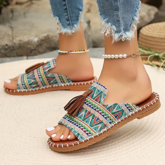 Damen Ethno-Slipper-Sandalen mit Quaste und handgenähter Ziernaht EB