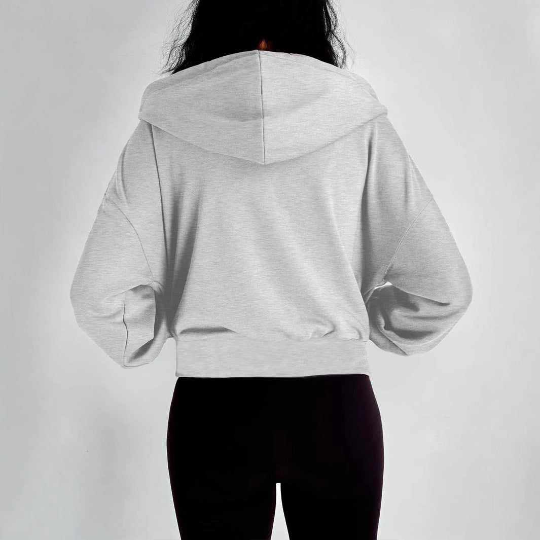Damen modischer Kapuzenpullover mit lässigem Schnitt und praktischen Taschen EB