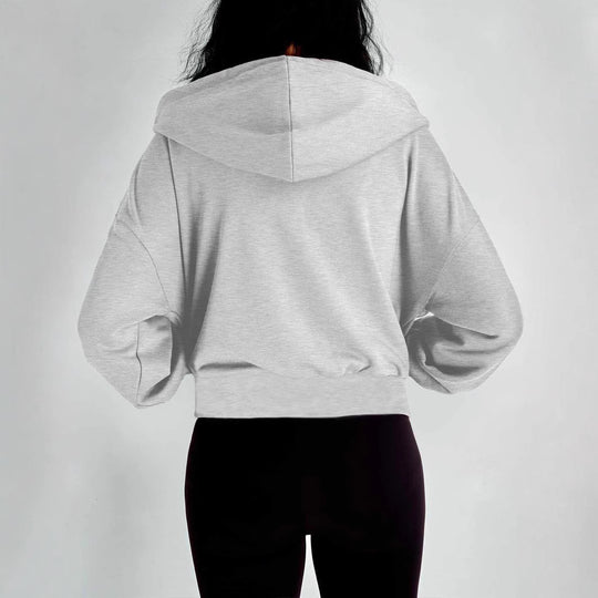 Damen modischer Kapuzenpullover mit lässigem Schnitt und praktischen Taschen EB