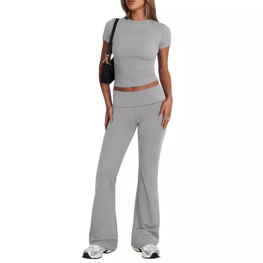 Damen Sportliches Kombination-Outfit mit körpernahem Top und ausgestellten Hosen EB