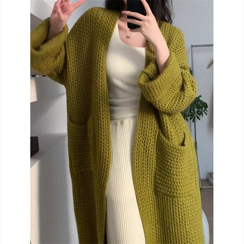 Damen Lange Strickjacke mit praktischen Taschen und modischem Zopfmuster EB