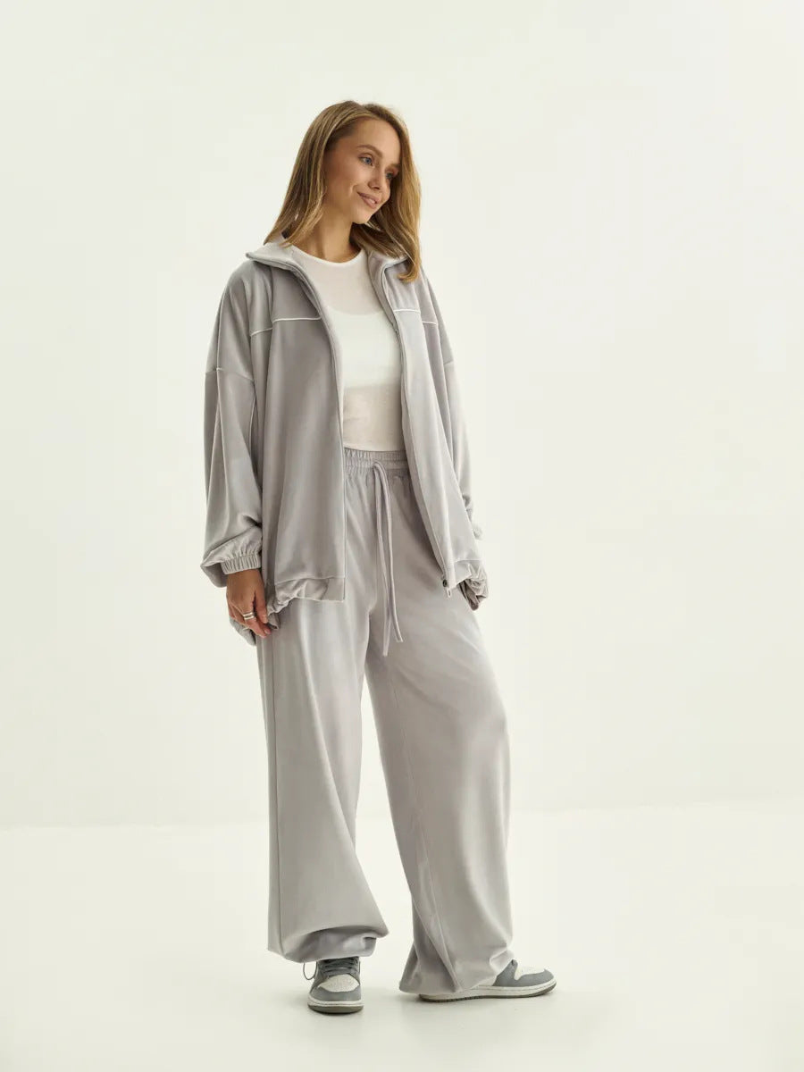 Damen Palazzo-Lounge-Set aus seidig-weichem Nicki mit hoher Kragenblende, Oversize-Passform und elastischer Bundhose Eichborn Berlin