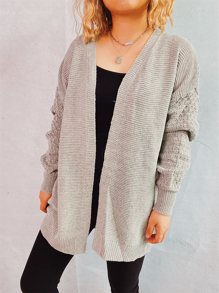 Damen lässige Strickjacke mit voluminösen Ärmeln und modernem Strukturmuster EB