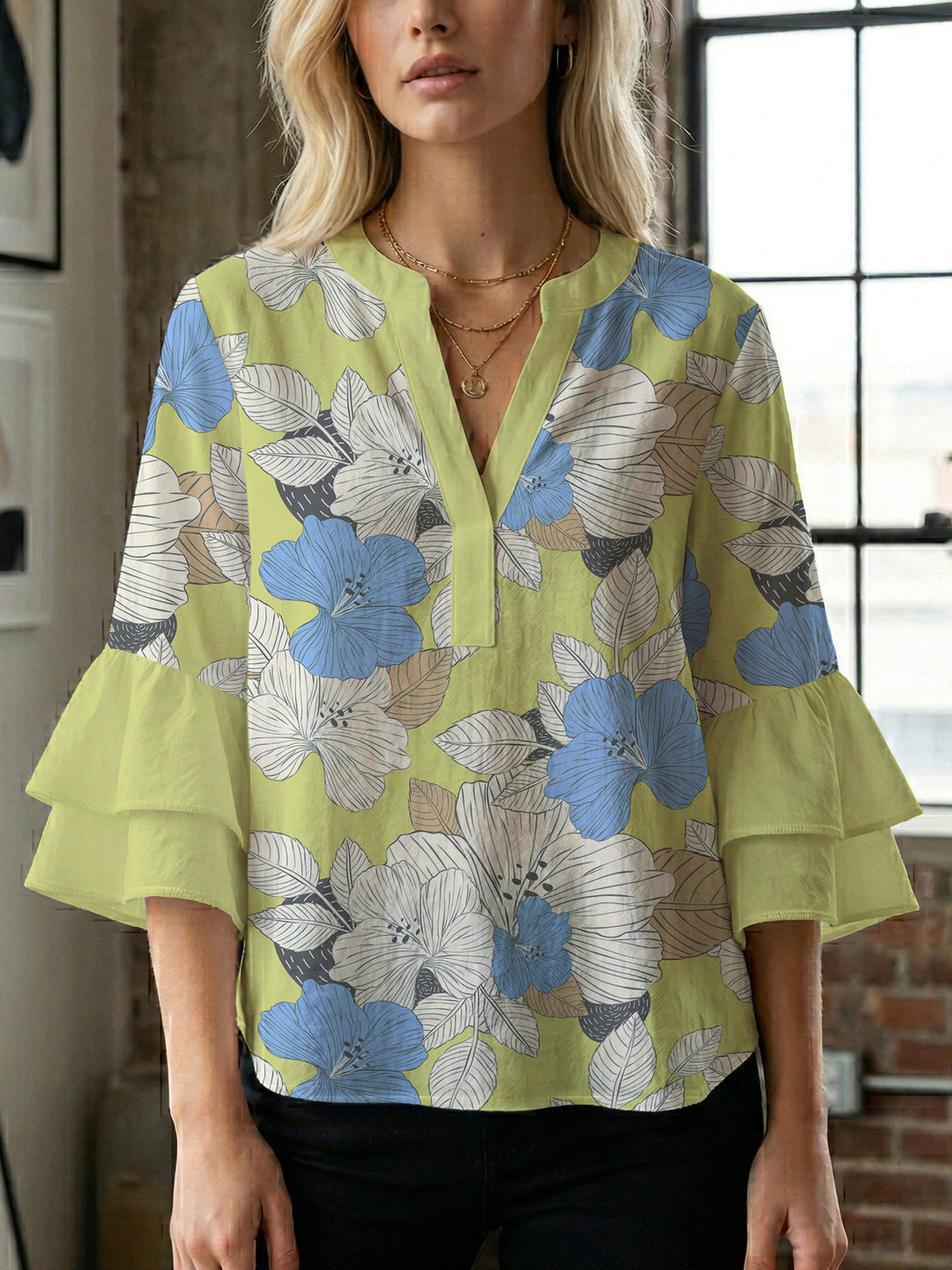 Damen Bluse mit voluminösen Ärmeln und floralem Design EB