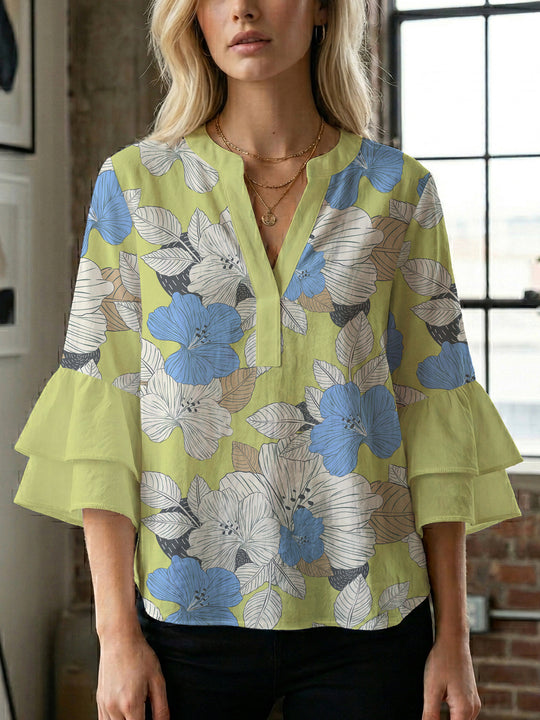 Damen Bluse mit voluminösen Ärmeln und floralem Design EB