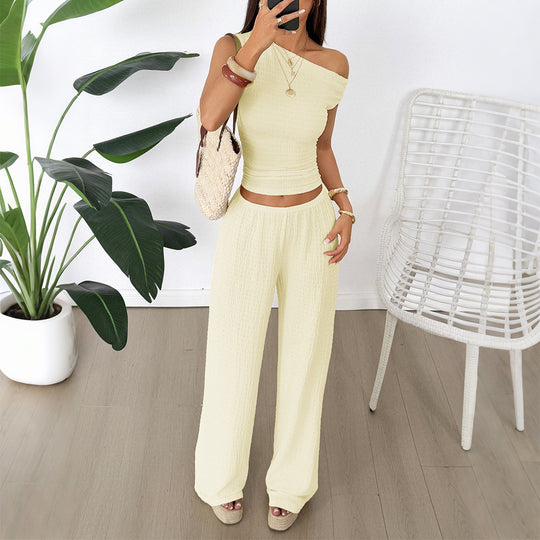 Damen Zweiteiliges Set aus elastischem Rippstoff mit asymmetrischem Top und weitem Hosen EB