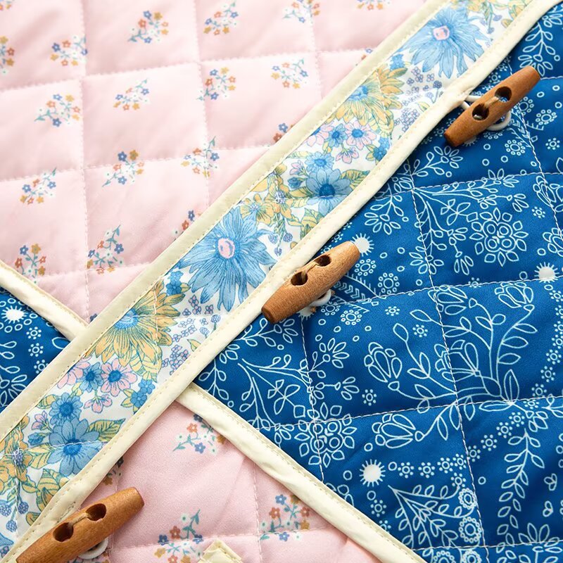 Damen gesteppte Übergangsjacke mit floralen Mustern und großen Taschen EB