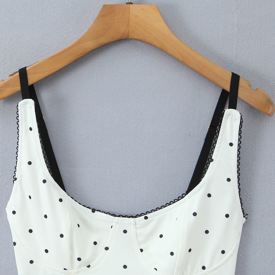 Damenoberteil mit eleganter Polka-Dot-Optik und feinen Details EB