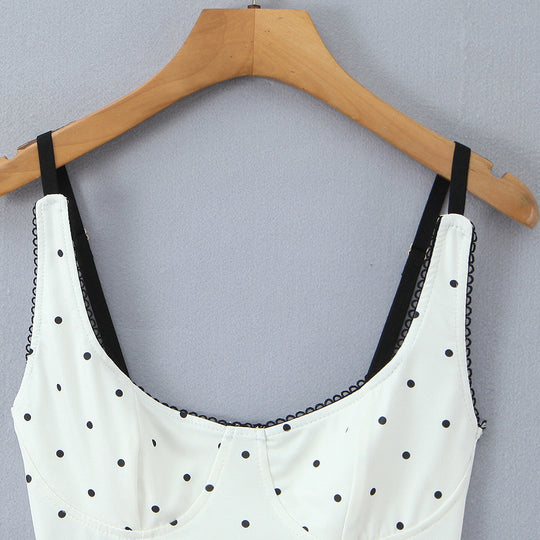 Damenoberteil mit eleganter Polka-Dot-Optik und feinen Details EB