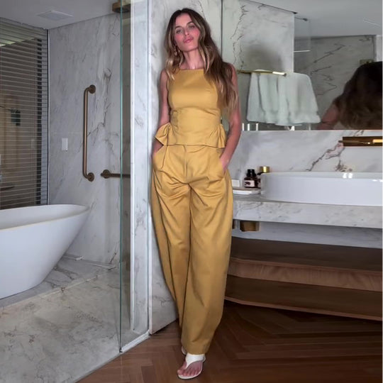 Damen Elegantes Jumpsuit mit peplum Detail und weitem Bein EB