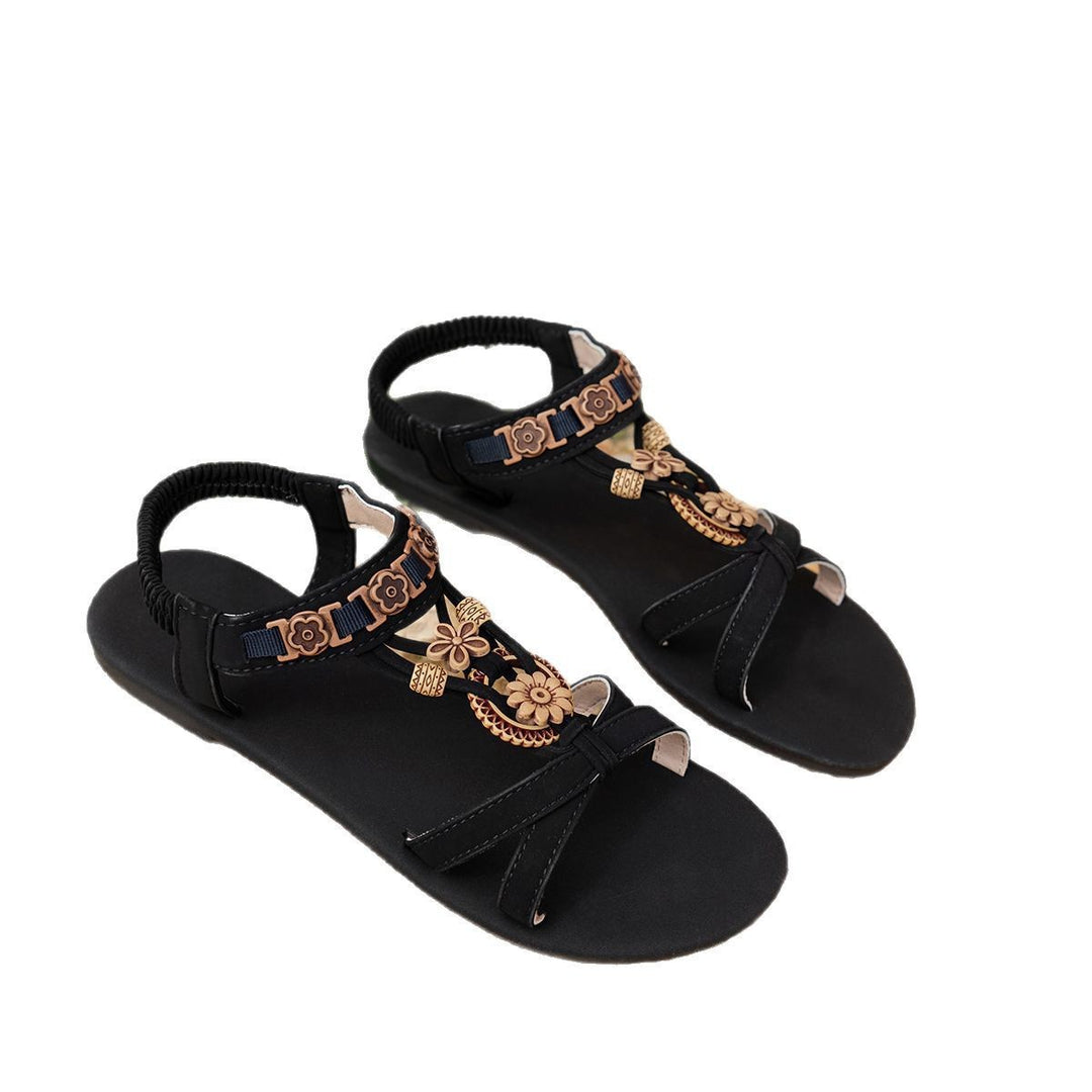 Damen Riemchen-Sandalen mit floralem Schmuckdetail EB