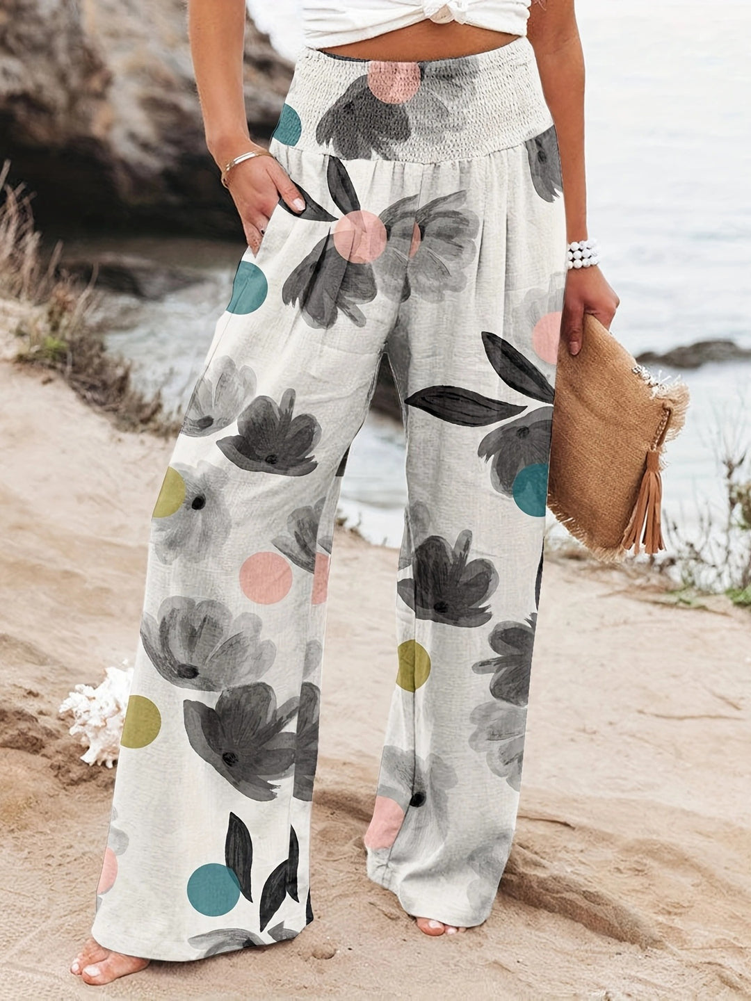 Damen Weit geschnittene Strandhose mit floralem Motiven und elastischem Bund EB